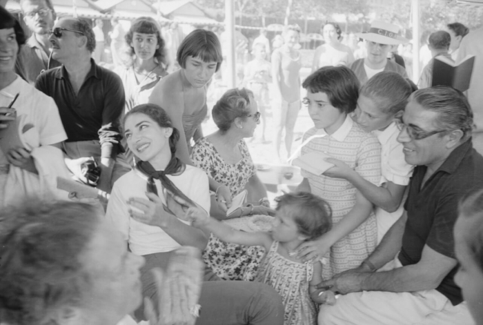 Signing autographs with Greek shipping tycoon Aristotle Onassis at the XVIII Venice International Film Festival